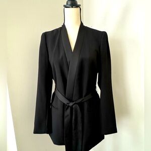 Vince Camuto black blazer. Worn one time. Size 8. Satin trim.